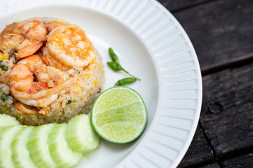Fried rice with shripms with fresh cucumber and lime, healthy asain food