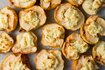 baked apples with curd on white paper. copy space