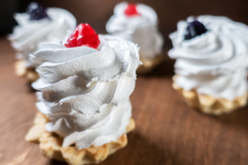 protein cakes basket with berries on table