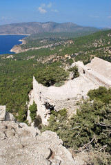 Fototapeta na wymiar View of the coast and the ruins of Monolithos Castle, Rhodes Island, Greece