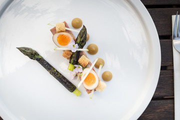 egg and asparagus appetiser, delicate presentation 