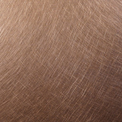 Closeup old scratched metal surface brass texture background. Shabby bronze background.