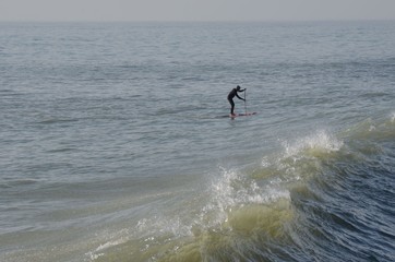 Alone face in danger, paddle