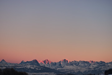 Colorful evening sky gradient with fameous jungfrau mountain range seen from the little mountain...