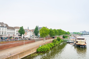 Naklejka premium MAASTRICHT, THE NETHERLANDS - june 10, 2018: Street view of Buildings around Maastricht, Netherlands.