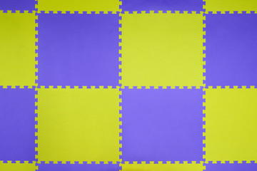 dirty playground mat for children in public place, blue and yellow color rubber jigsaw.