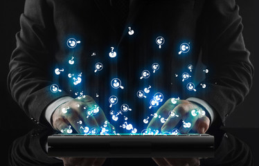 Business man working in office and icons appearing