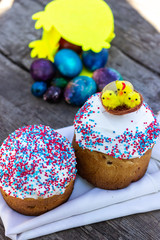 chicken with Easter eggs on wooden background