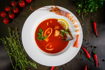 tomato soup in white bowl