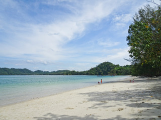 Beautiful coast with azure sea and white sand, Blue sky with cirrus clouds, copy space. Thailand.