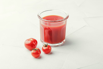 Glass of fresh organic tomato juice