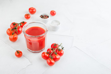 Glass of fresh organic tomato juice