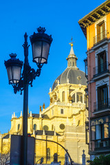 Fototapeta na wymiar Street lamp and the Cathedral, in Madrid