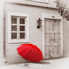 Red Umbrella in front of Retro Vintage European House Building, Narrow Street Scene in Monochrome Sepia Style. 3d Rendering