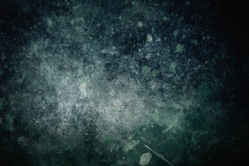 dark blue and green grungy background or texture