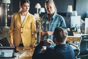 Meeting of three people in the office