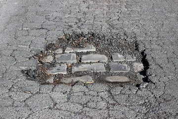 Asphalt crack fracture cobblestone surface texture