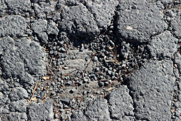 Asphalt crack fracture cobblestone surface texture
