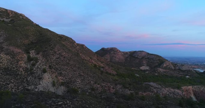sunset in mountains with epic sky , aerial shoot  4r UHd 