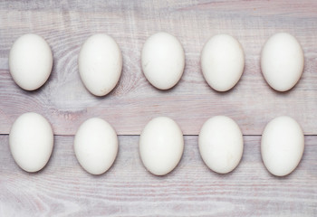 Eggs on wooden background