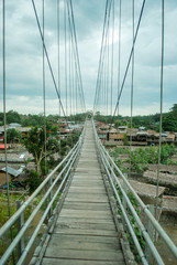 Obraz premium Hanging bridge in Bukit Lawang, Sumatra, Indonesia.