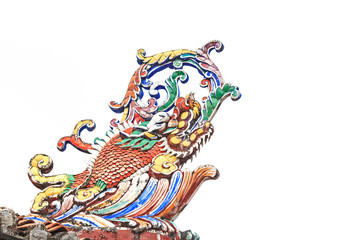 Beautiful chinese sculpture on the isolated on white background. Decorative roof in Chinese...