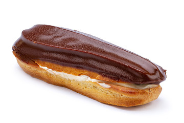 Traditional french dessert. Isolated eclair with custard and chocolate icing on white background....