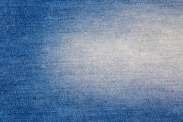 Blue jeans fabric. Denim jeans texture or denim jeans background.