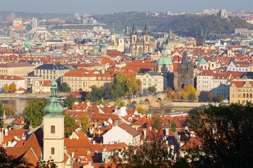 Naklejka na ściany i meble Prague - The city with the Charles bridge and the Old Town in evening light.
