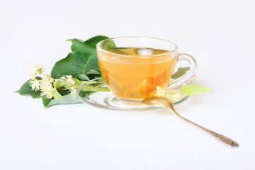 Linden tea in a glass cup.