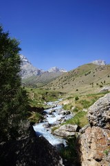 Rocky river in the mountain valley, Fann Mountains, Tajikistan 