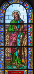 PRAGUE, CZECH REPUBLIC - OCTOBER 13, 2018: The apostle Saint Andrew in the stained glass of the church kostel Svatého Václava  (end of 19. cent).