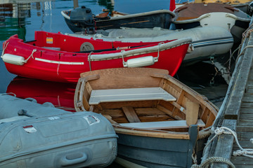 Fototapeta na wymiar Small Boats Tied to Pier