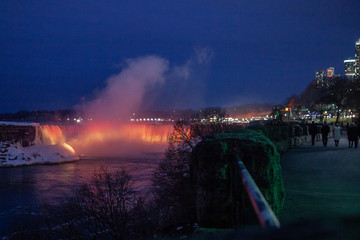 Niagara Falls CANADA - February 23, 2019: Winter frozen night view at the American side of...