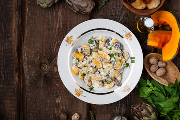 pumpkin gnocchi with mushroom and cream sauce