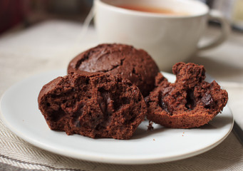 chocolate cake pieces close-up on a white plate