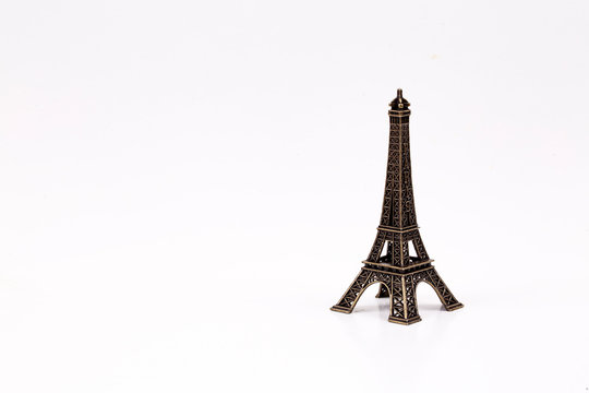 Miniatur Eiffel Tower Paris isolated. Travel concept photo.