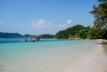 Boats on paradise beach, in Koh Panyam, Thailand.