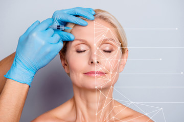 Close-up portrait of nice attractive aged woman with wrinkle eyes closed getting injection in...