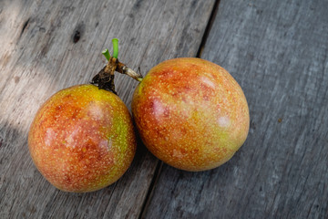Passion fruit on wooden table