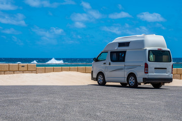 Campervan parking at the beach of Gregory in Western Australia during windy but sunny day