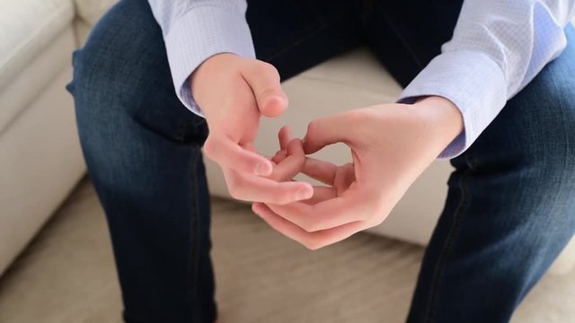 The hands of teenager who pulls the fingernails