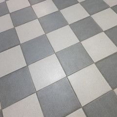 Square tile close up. Tile on the floor close up.