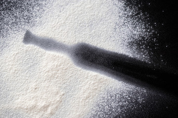 Flour on black background