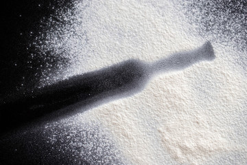 Flour on black background