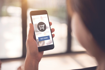 Online payment. Hands of woman using mobile smartphone for online shopping.