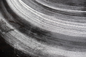 black graphite background with flour