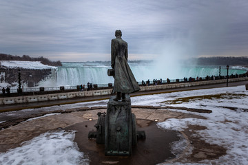 Niagara Falls CANADA - February 23, 2019: Nikola Tesla Sculpture in Queen Victoria Park in Niagara Falls, Canada. The monument was designed by sculptor Les Drysdale and opened in 2006.