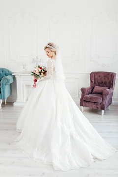 Glamorous bride in wedding dress 