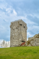 Fototapeta na wymiar Detailed view of medieval Montalegre castle, dramatic sky as background